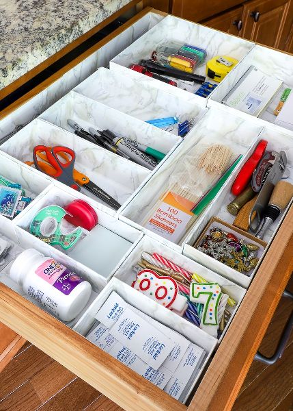 Cardboard boxes are the ultimate when it comes to DIY organization! Here are 20 Creative Ways to Organize with Cardboard Boxes of all shapes and sizes!