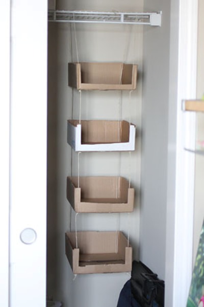 Cardboard boxes are the ultimate when it comes to DIY organization! Here are 20 Creative Ways to Organize with Cardboard Boxes of all shapes and sizes!