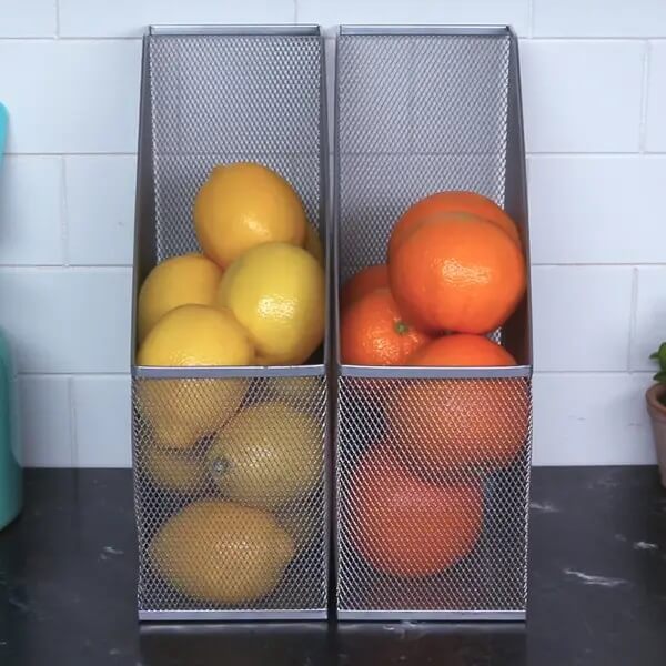 Who'd think magazine holders could be so useful? Check out these 25 Inventive Ways to Organize with Magazine Holders in your kitchen, office and more!
